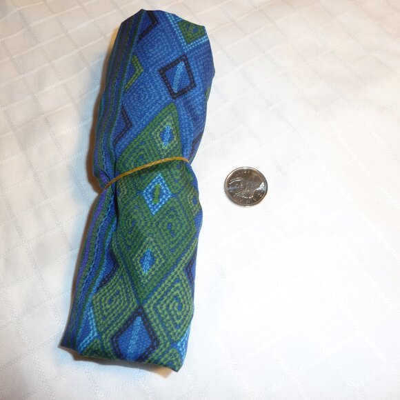 Ethnic patterned fabric with a leopard print center and clean geometric borders - Picture 3 of 3